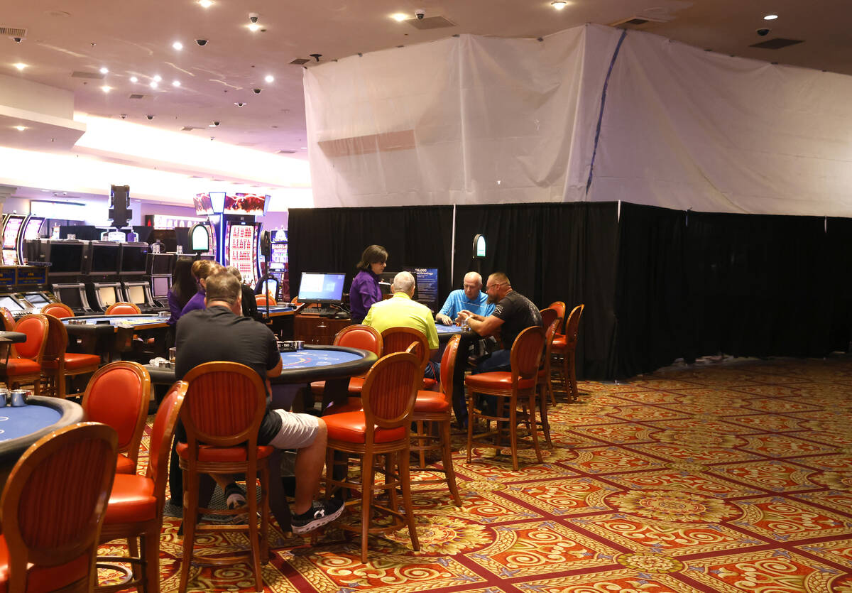 Patrons gamble at the CasaBlanca hotel-casino as construction is underway on the Showroom, righ ...