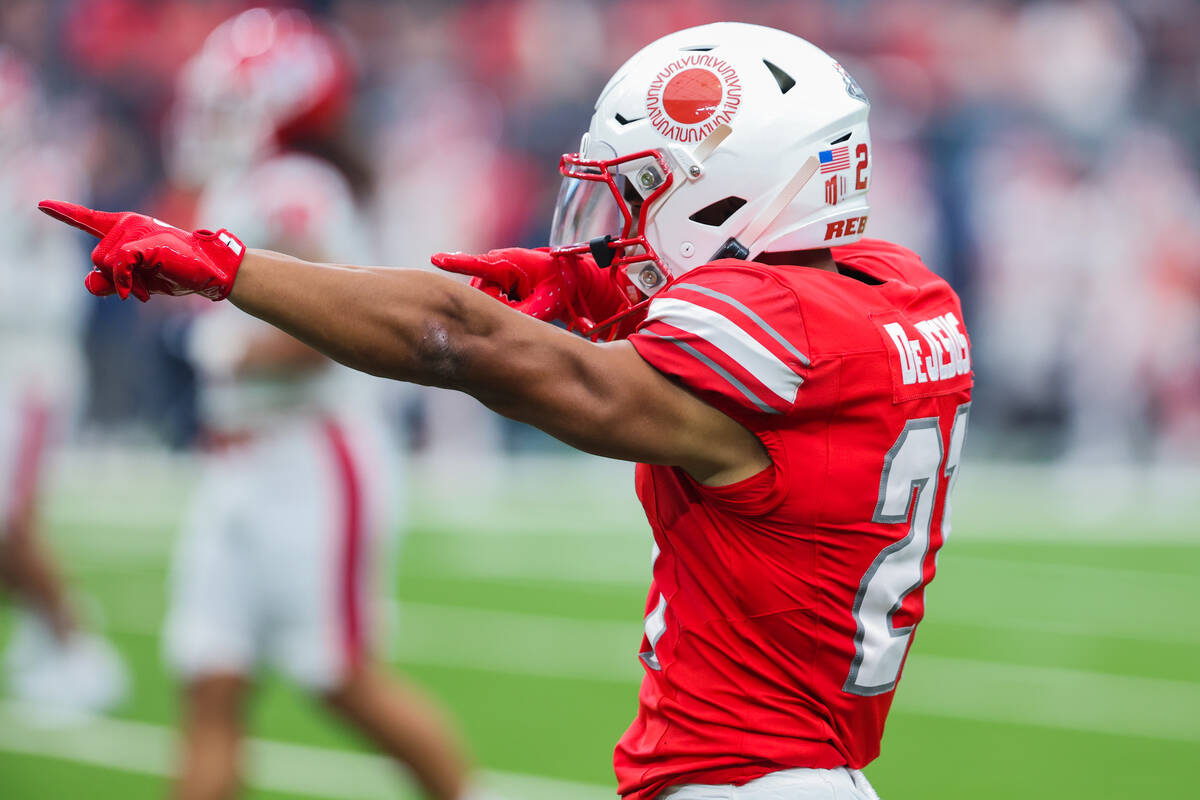 UNLV Rebels wide receiver Jacob De Jesus (21) points to a section of fans during an NCAA footba ...