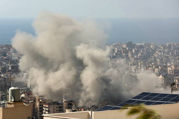 Smoke billows following an Israeli airstrike that targeted Beirut's southern suburbs on Oct. 3, ...