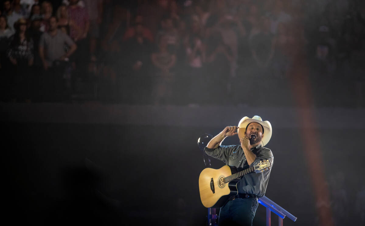 Garth Brooks performs before the crowd at Allegiant Stadium on Friday, July 10 2021, in Las Veg ...