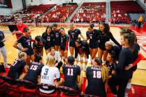 Coach Dawn Sullivan talks to the UNLV volleyball team during its match against San Diego State ...