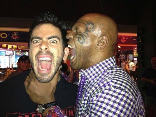 Mike Tyson takes a bite out of Eli Roth. (Courtesy photo by Goretorium)