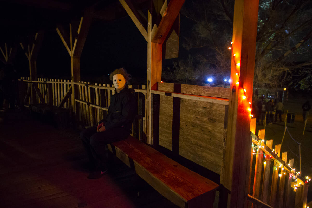 A costumed actor waits to scare visitors during "Bonnie Screams" at Bonnie Springs Ranch outsid ...