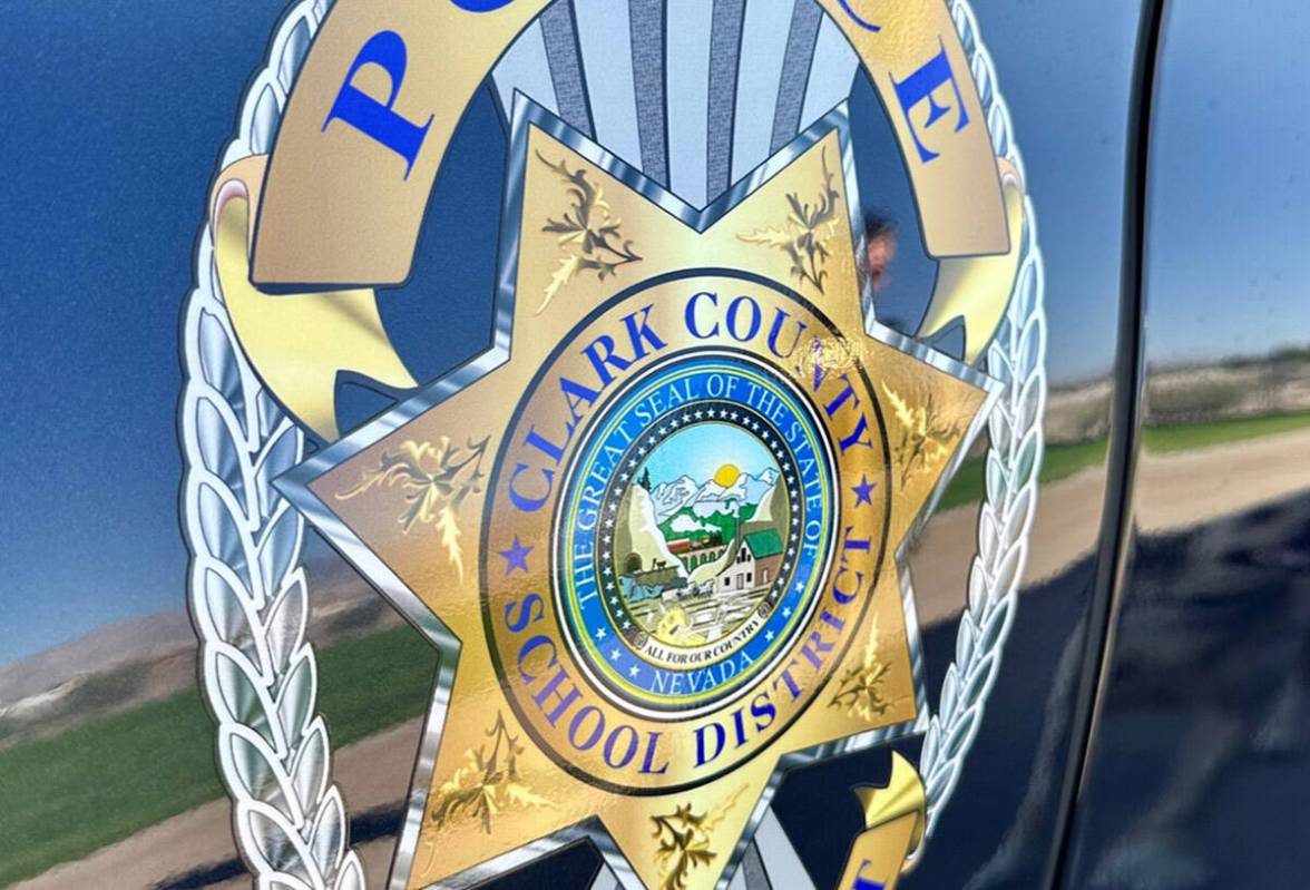 The Clark County School District Police Department insignia is seen on the side of a school pol ...