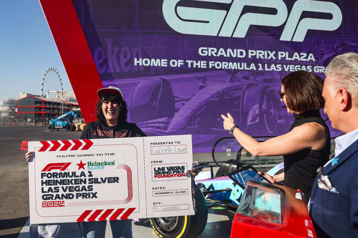 Gabrielle Lowe, 16, holds her ticket to the Formula One Las Vegas Grand Prix before taking a be ...