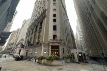 FILE - The entrance to the New York Stock Exchange at Wall and New Streets is shown on Oct. 2, ...