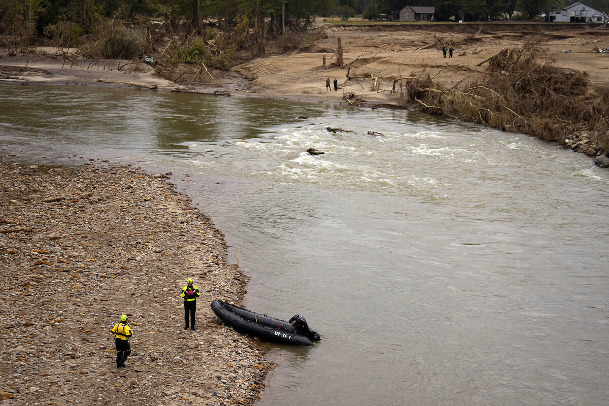 Personnel from Urban Search and Rescue Utah Task Force 1 work in the aftermath of Hurricane Hel ...