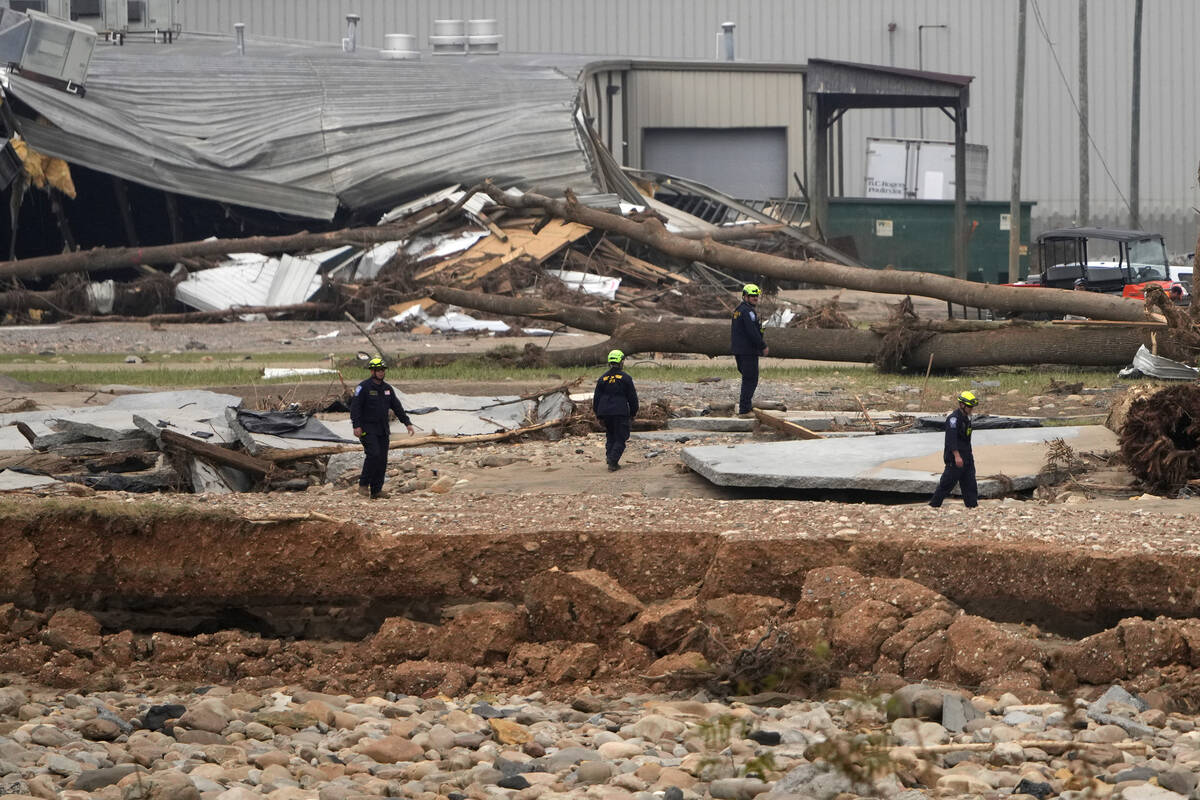 Personnel from Urban Search and Rescue Utah Task Force 1 work in the aftermath of Hurricane Hel ...