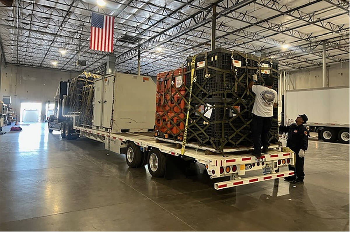 Nevada Task Force-1 members secure a truck shortly before leaving Friday, Sept. 27, 2024, for t ...