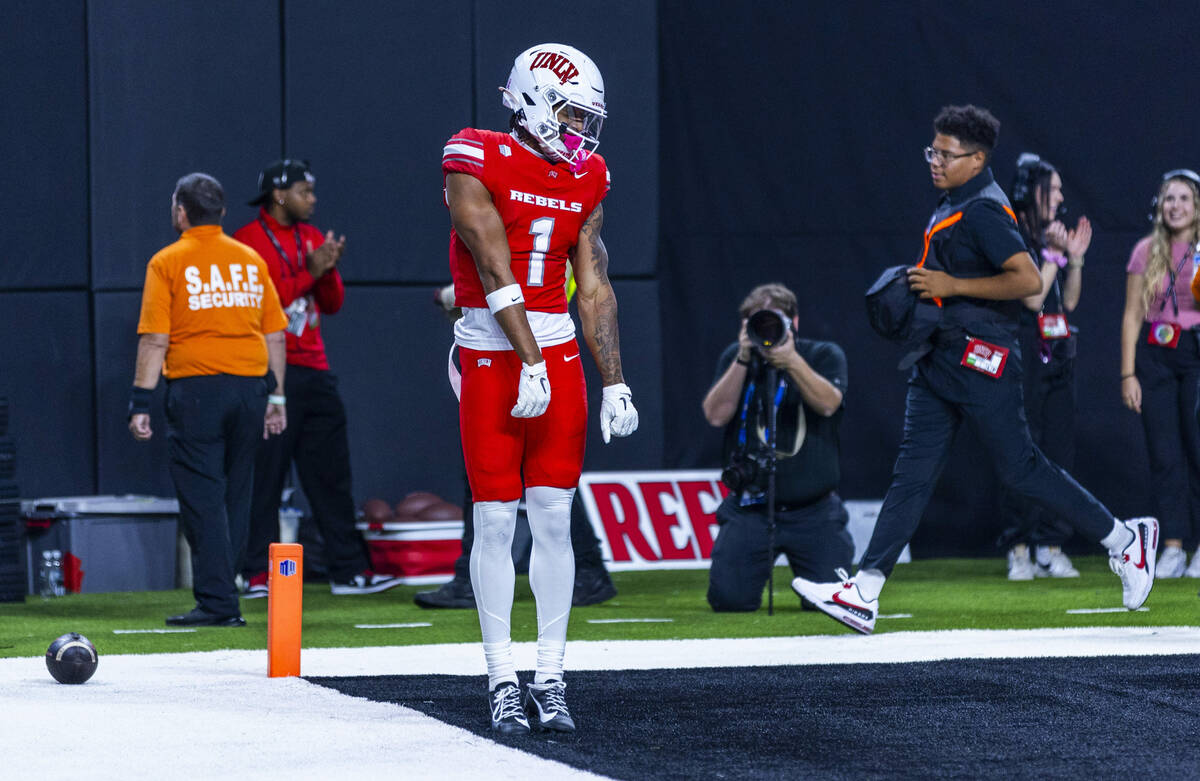 UNLV wide receiver Casey Cain (1) celebrates a touch against the Syracuse Orange during the fir ...