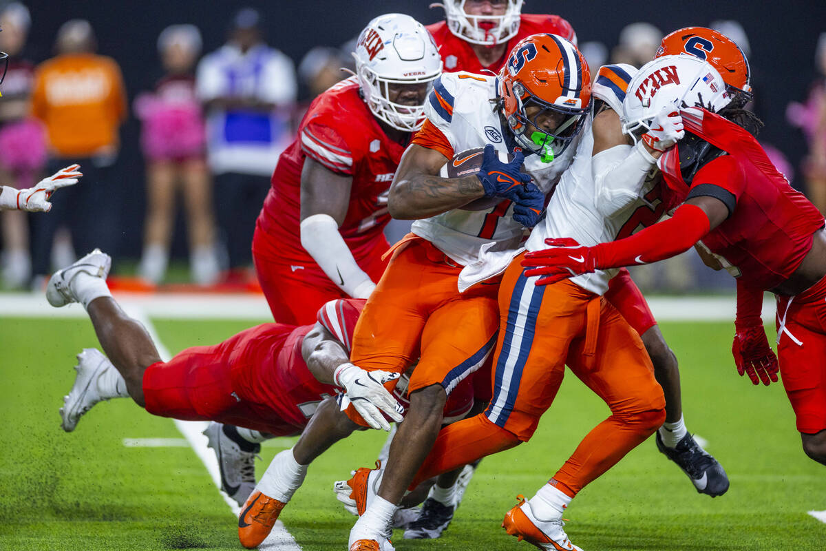 Syracuse Orange running back LeQuint Allen (1) is stopped by the UNLV defense on a run during t ...