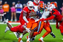 Syracuse Orange running back LeQuint Allen (1) is stopped by the UNLV defense on a run during t ...