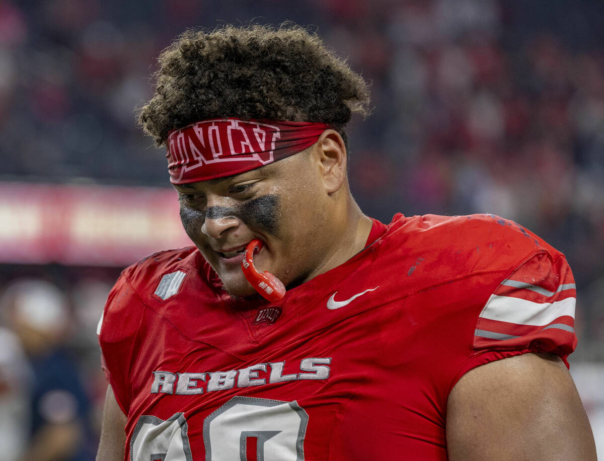 UNLV offensive lineman Jayden Ahboah (68) walks off the field after an overtime loss to the Syr ...