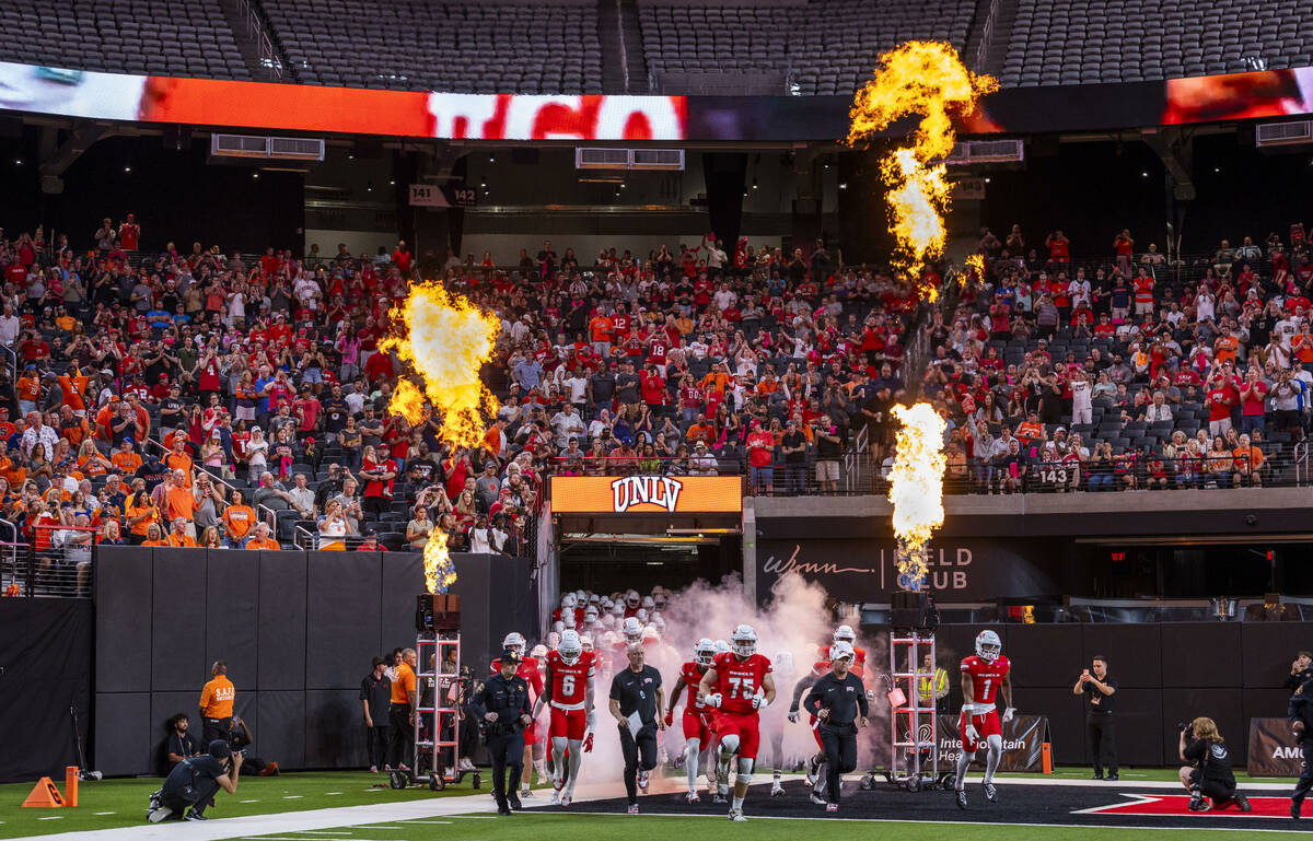 UNLV emerges from the tunnel onto the field to take on the Syracuse Orange during the first hal ...