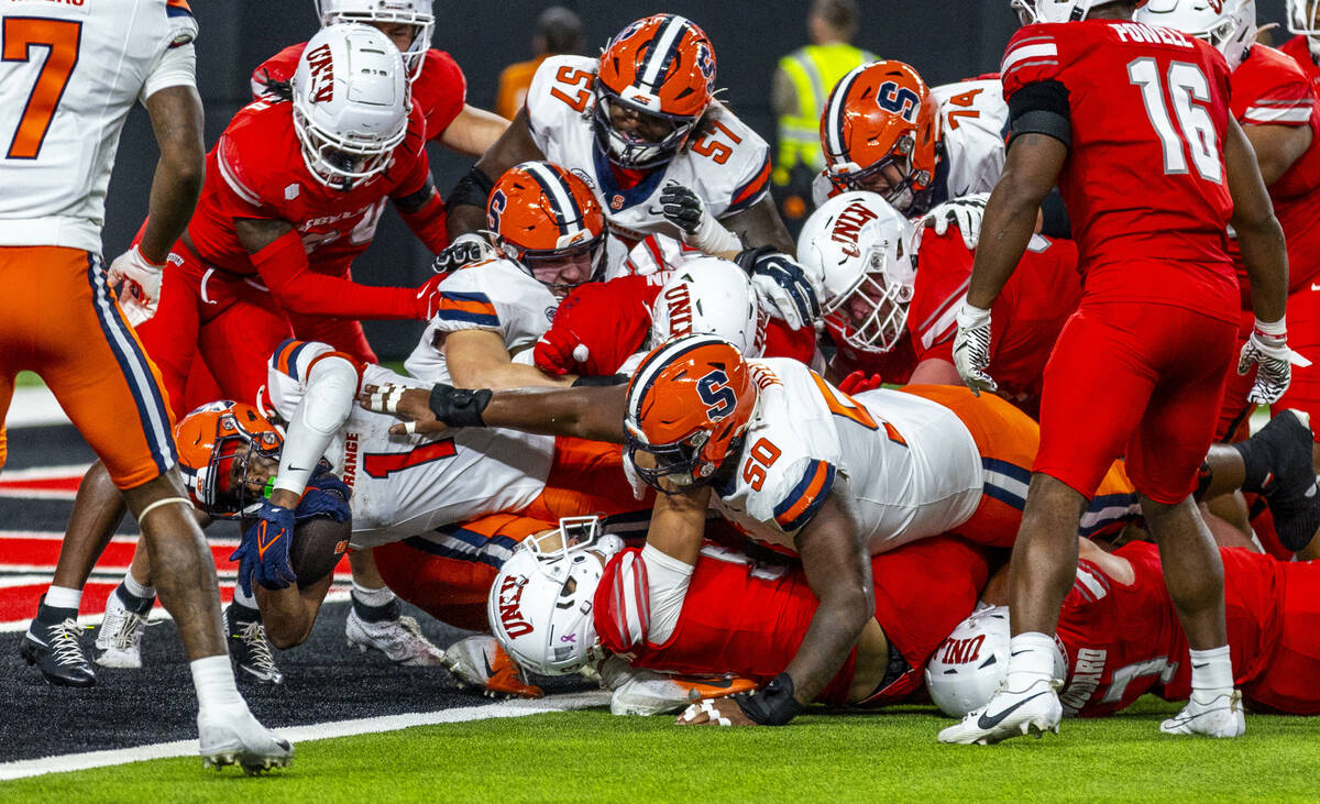 Syracuse Orange running back LeQuint Allen (1) dives into the end zone against the UNLV defense ...