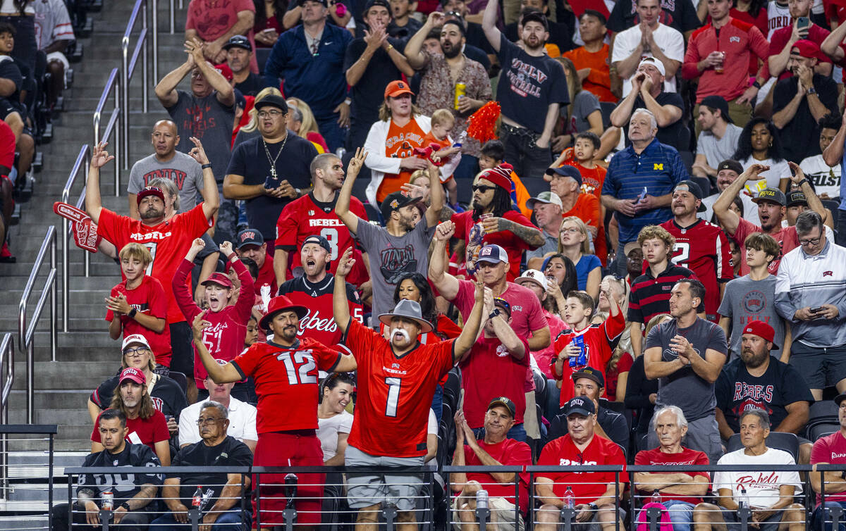 UNLV fans react to another score while battling the Syracuse Orange during the first half of th ...