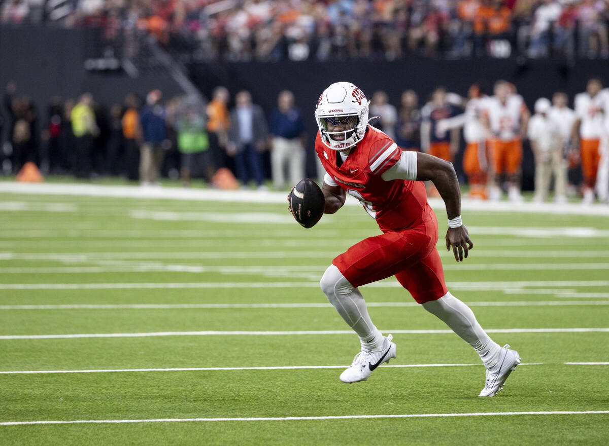 UNLV quarterback Hajj-Malik Williams (6) runs with the ball during the college football game ag ...