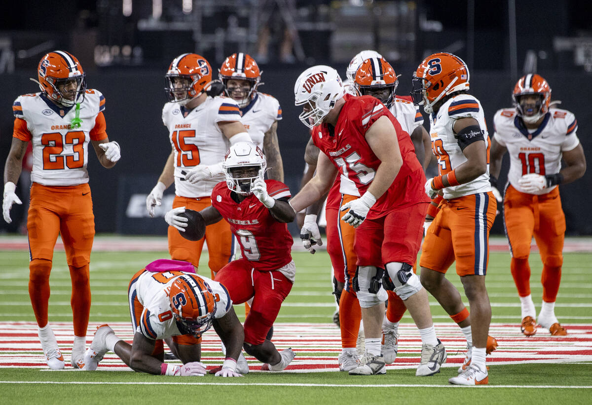 UNLV running back Jai'Den Thomas (9) celebrates making a first down during the college football ...