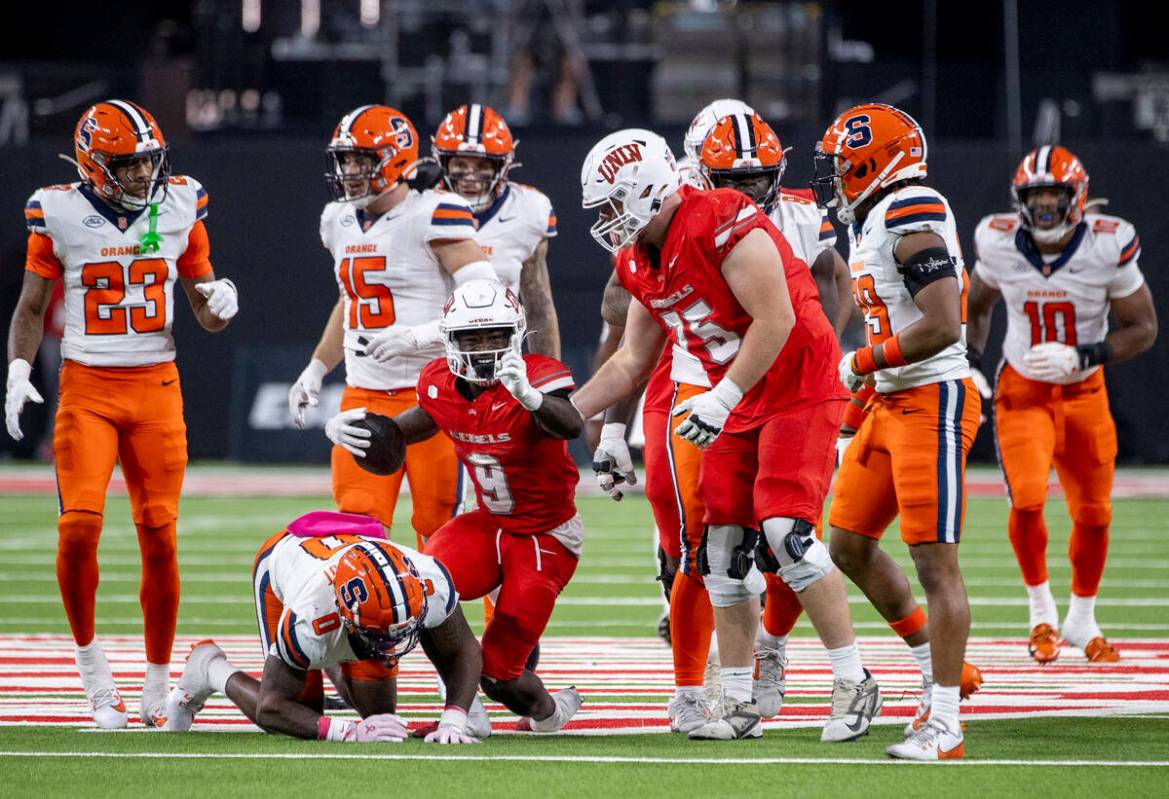 UNLV running back Jai'Den Thomas (9) celebrates making a first down during the college football ...