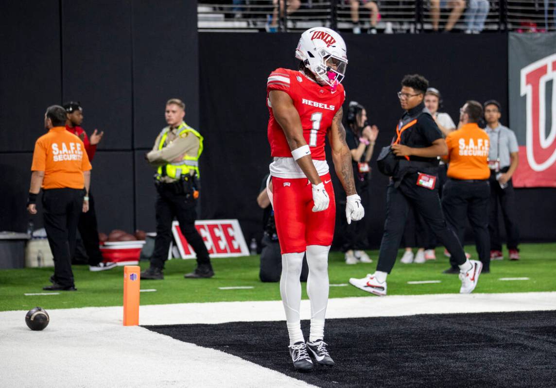 UNLV wide receiver Casey Cain (1) celebrates scoring a touchdown during the college football ga ...