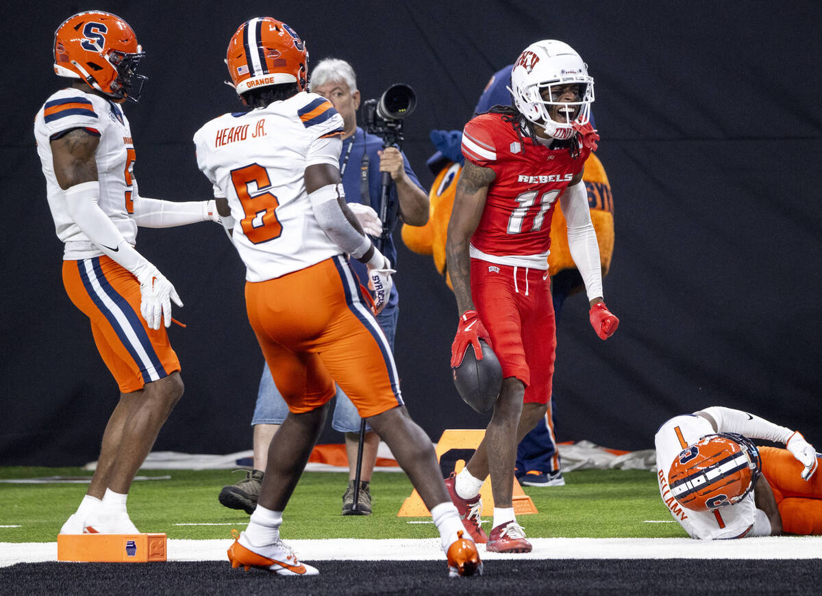 UNLV wide receiver Ricky White III (11) celebrates a big run during the college football game a ...