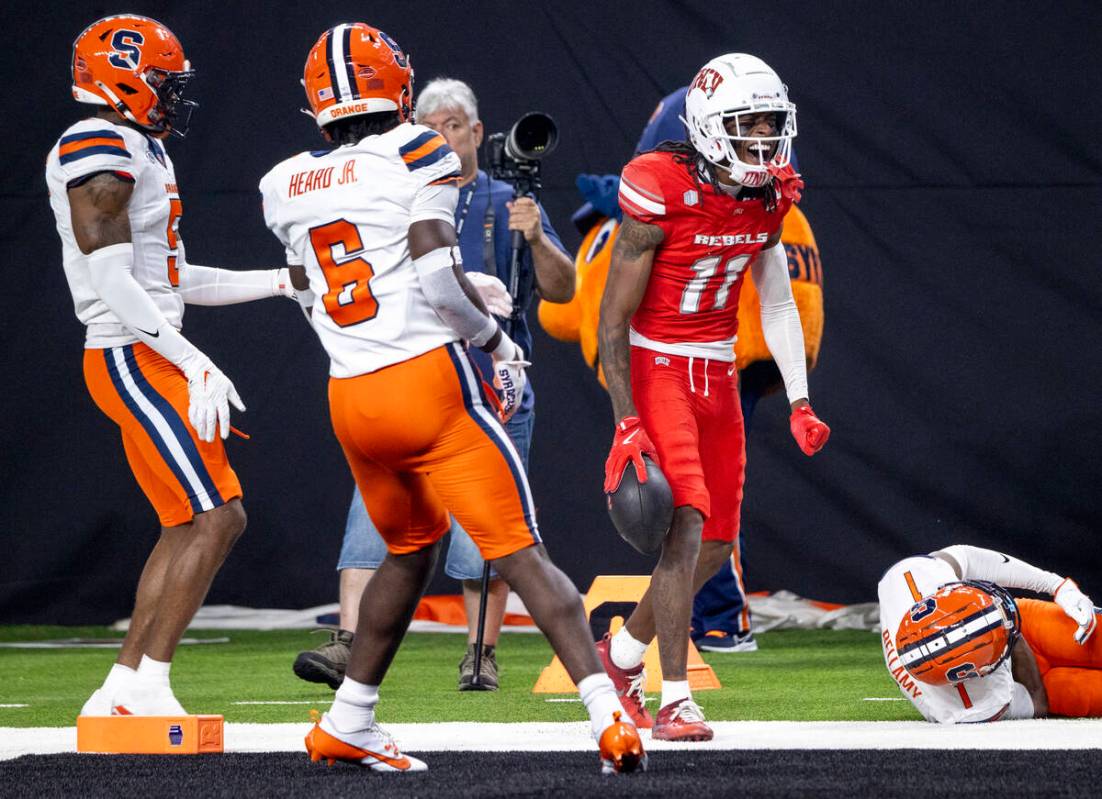 UNLV wide receiver Ricky White III (11) celebrates a big run during the college football game a ...