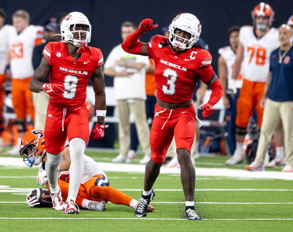 UNLV defensive back Johnathan Baldwin (3) celebrates after making a tackle during the college f ...