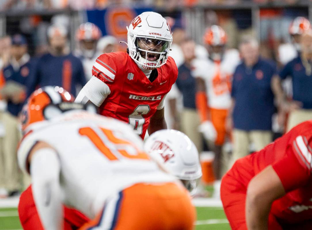 UNLV quarterback Hajj-Malik Williams (6) prepares to snap the ball during the college football ...