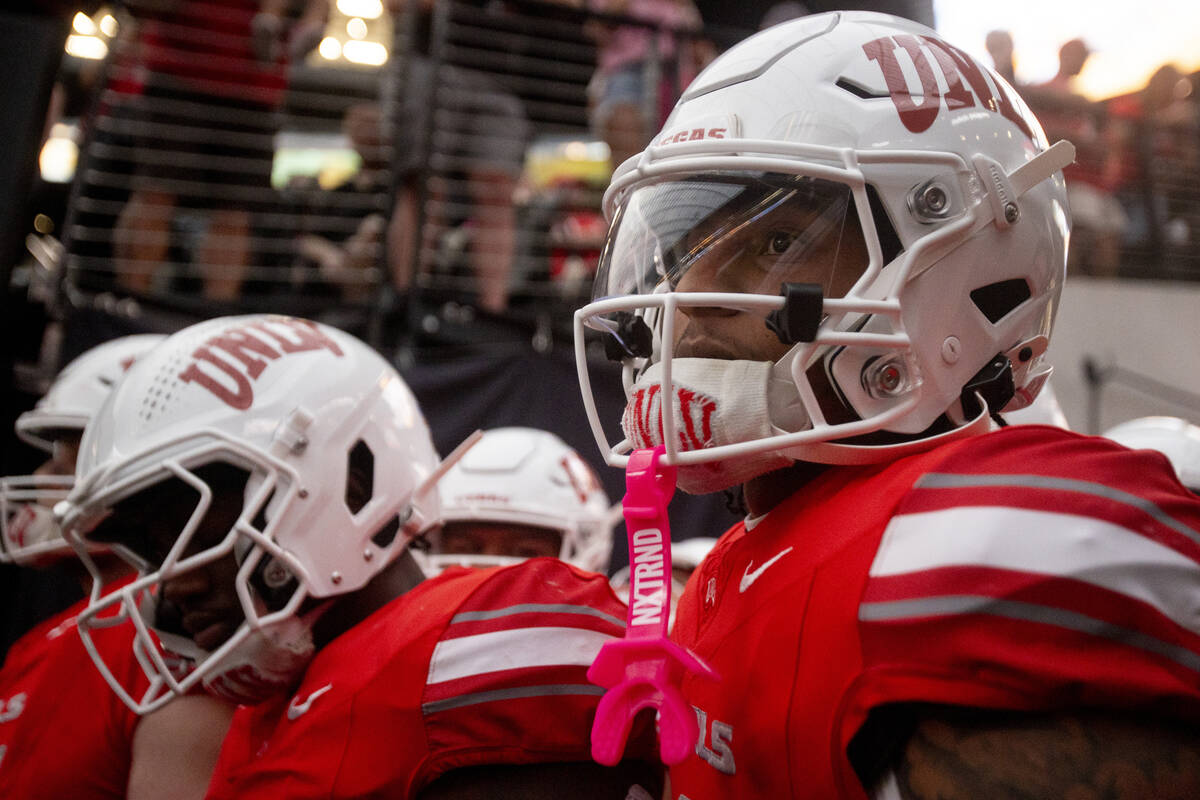 UNLV players wait to exit the tunnel before the college football game against the Syracuse Oran ...