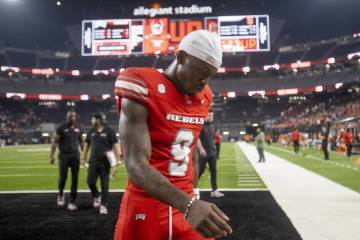 UNLV defensive back Jett Elad (9) walks off the field after losing the college football game to ...