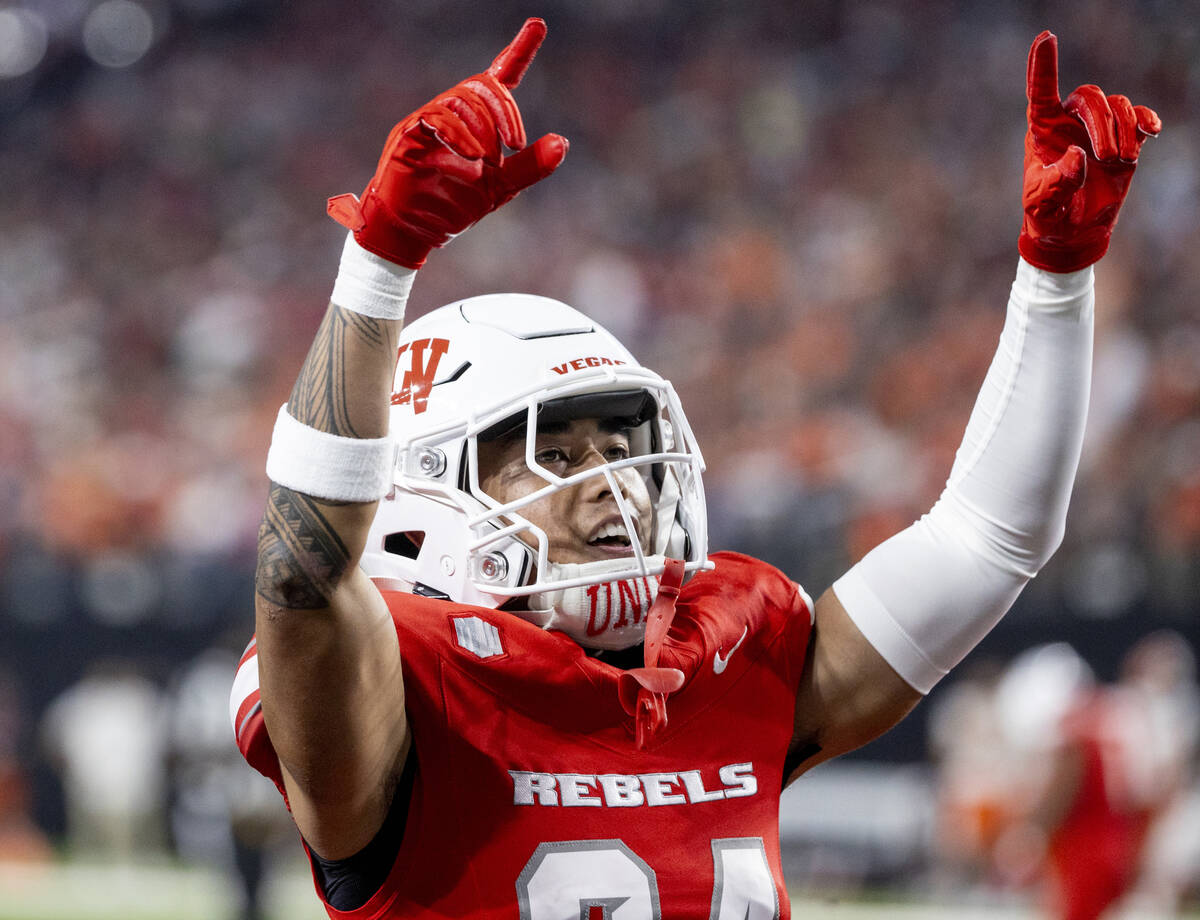 UNLV defensive back Kodi DeCambra (24) pumps-up the crowd after a punt during the college footb ...