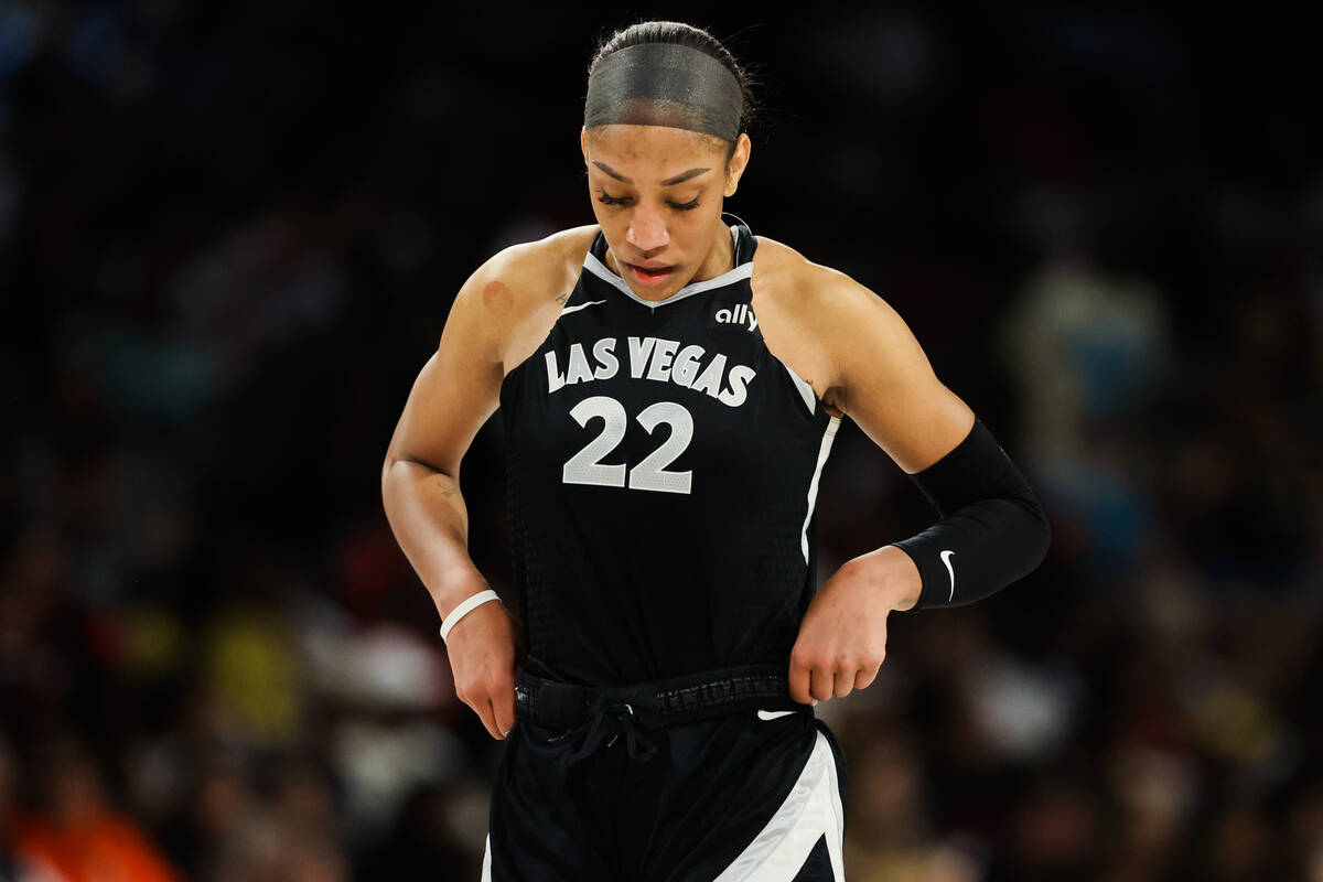 Aces center A'ja Wilson (22) adjusts her shorts as during game three of a WNBA semifinals playo ...