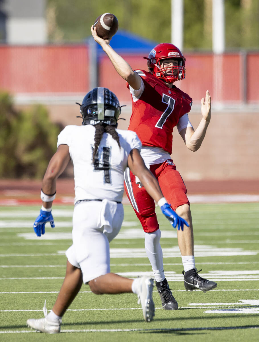 Arbor View quarterback Thaddeus Thatcher (7) throws the ball during the high school football ga ...