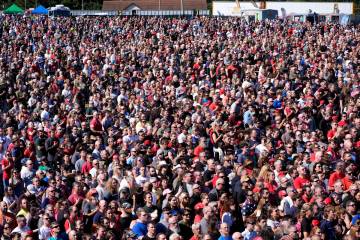 Attendees stand during the Pledge of Allegiance before Republican presidential nominee former P ...