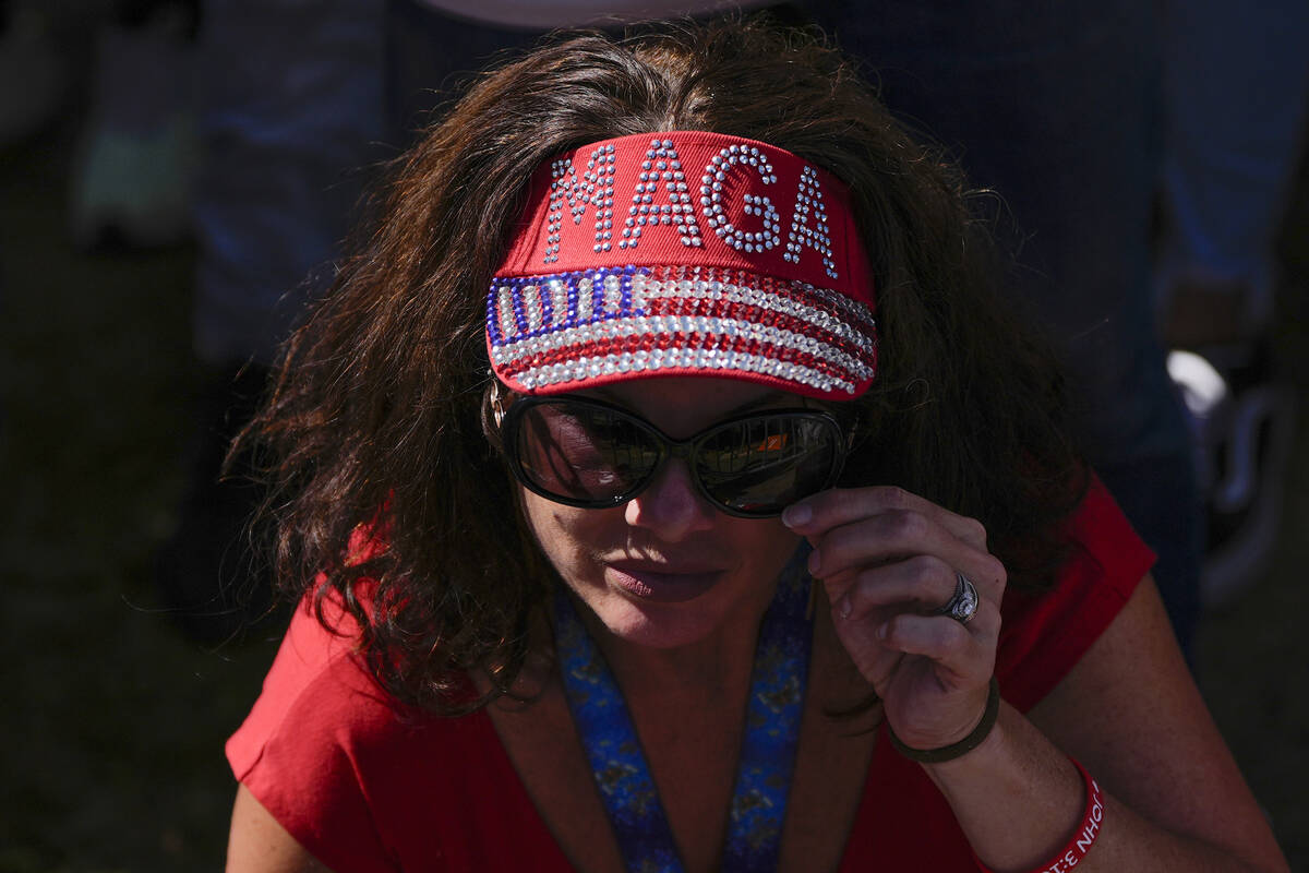 A supporter arrives before Republican presidential nominee former President Donald Trump speaks ...