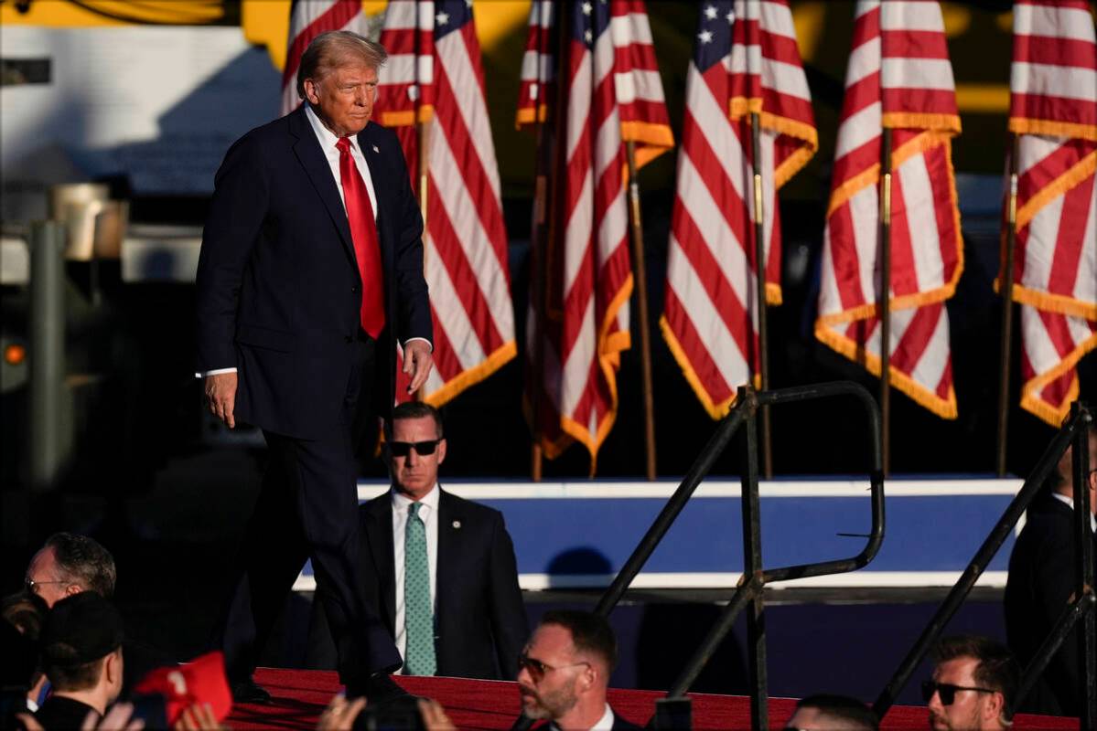 Republican presidential nominee former President Donald Trump arrives at a campaign rally at th ...