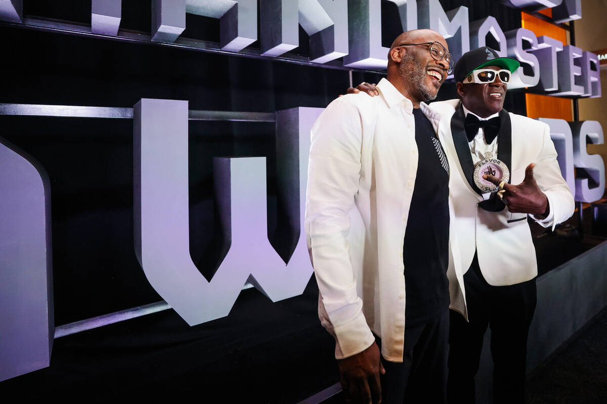 DJ Jazzy Jeff, left, poses with Flavor Flav during the Paid in Full Foundation’s Hip Hop ...