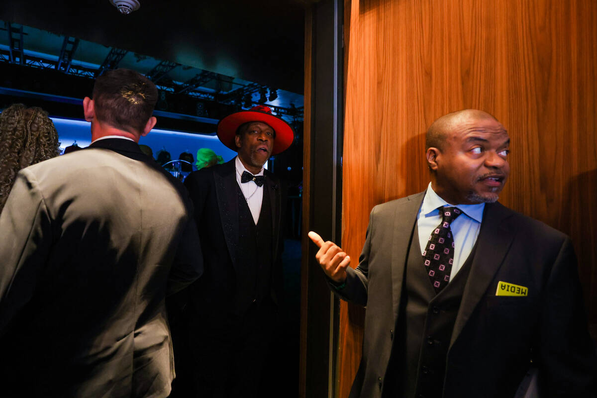 Grandmaster Caz, middle, watches guests pile in during the Paid in Full Foundation’s Hip ...