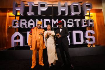 Kool Moe Dee, from left, Roxanne Shante and Grandmaster Caz, all honorees, pose for a photograp ...