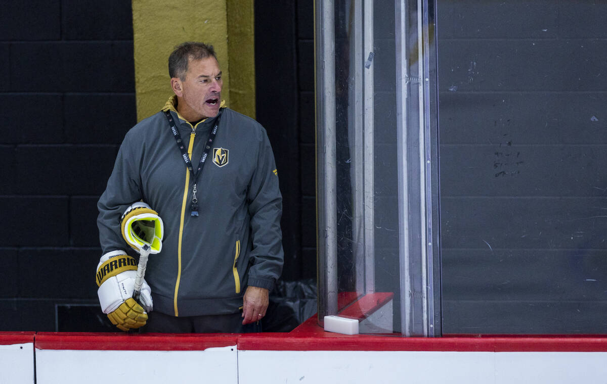 Golden Knights Head Coach Bruce Cassidy yells instructions to his players during training camp ...