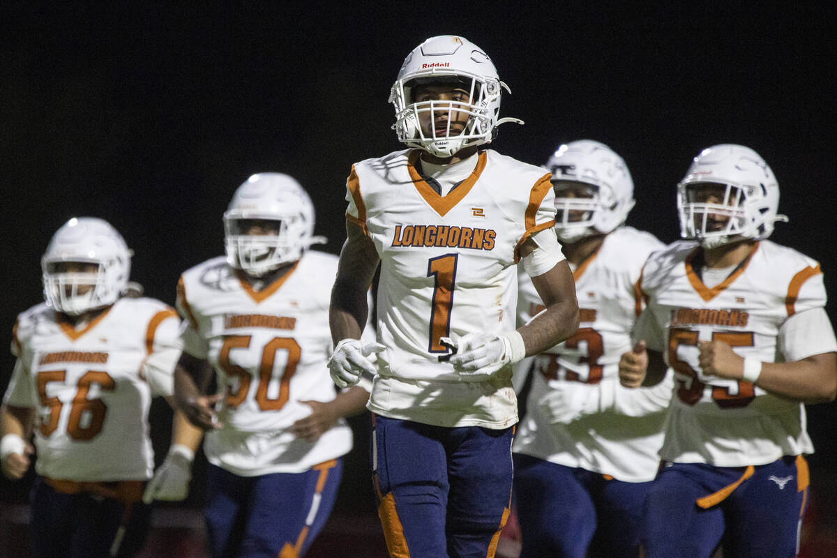 Legacy senior Dominic Oliver (1) leaves the huddle during the Class 5A high school ‘Batt ...