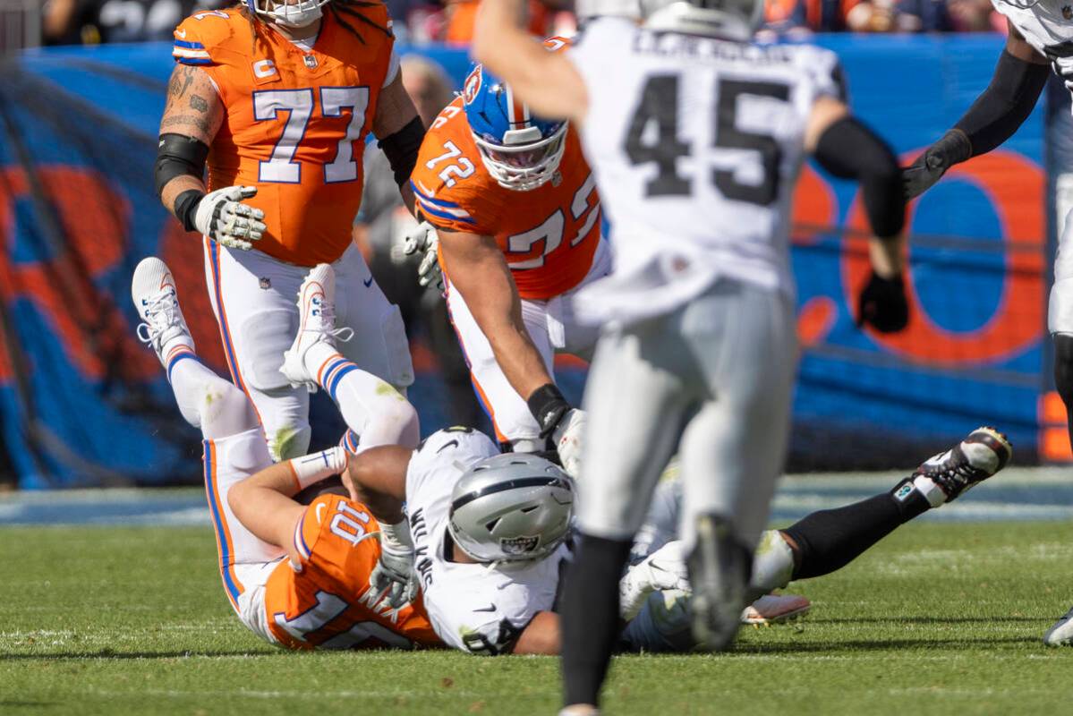 Raiders defensive tackle Christian Wilkins (94) sacks Denver Broncos quarterback Bo Nix (10) du ...