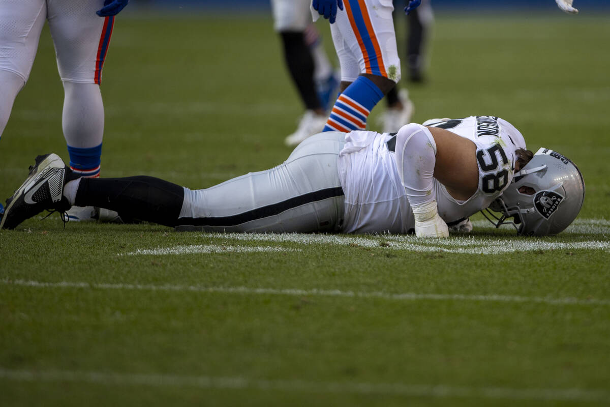 Raiders guard Jackson Powers-Johnson (58) remains down on the field after a play during the sec ...