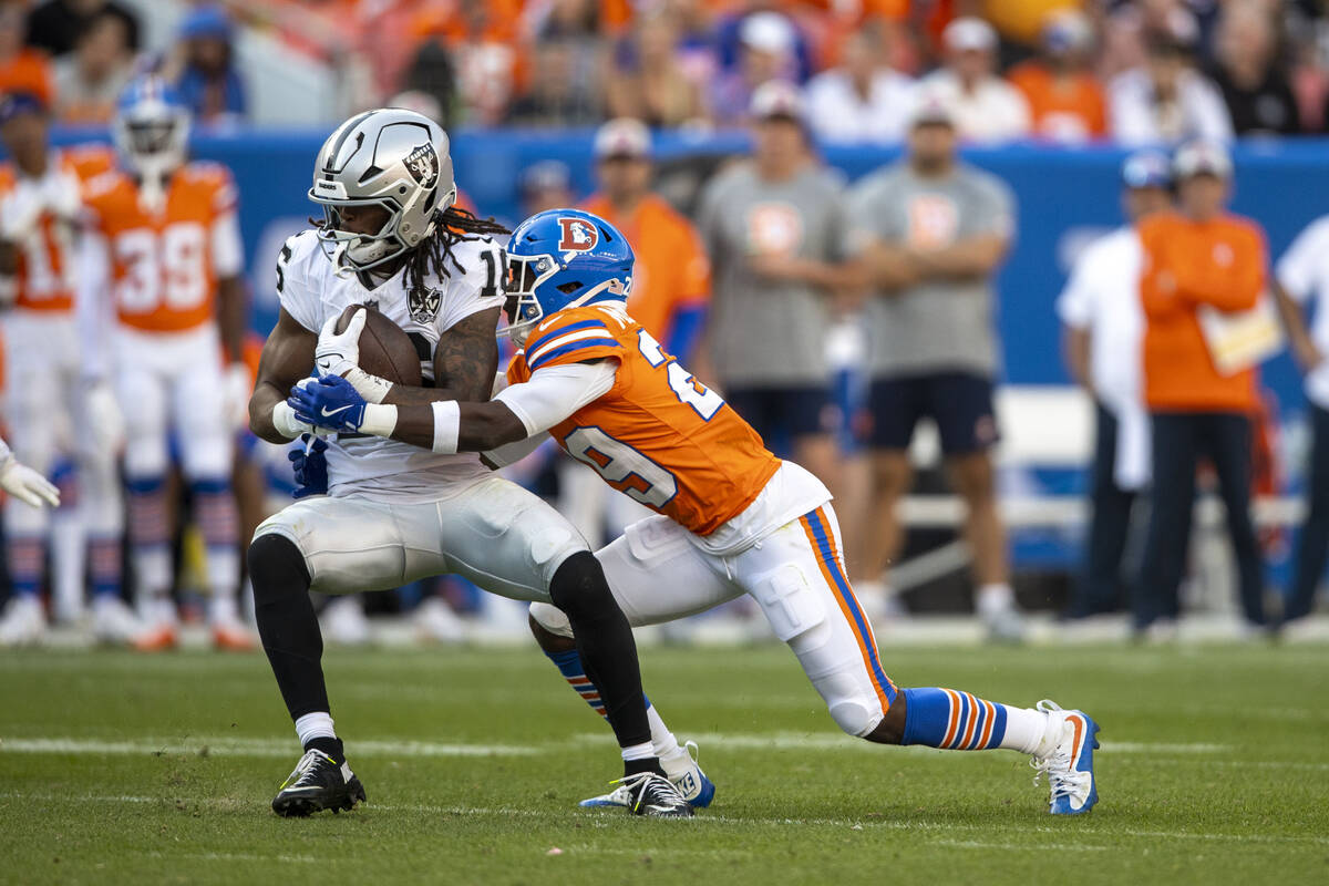 during the _half of an NFL game at Empower Field at Mile High Stadium on Sunday, Oct. 6, 2024, ...