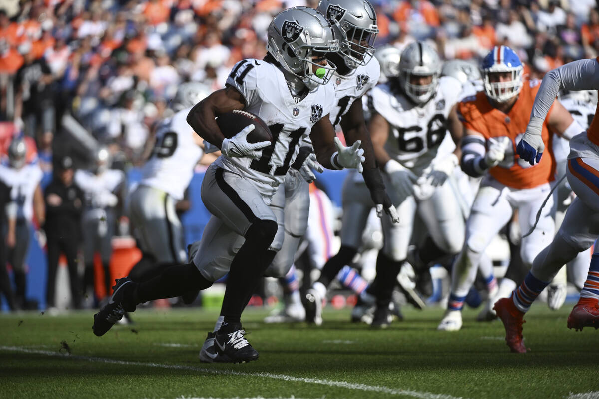 Las Vegas Raiders wide receiver Tre Tucker (11) runs during the second half of an NFL football ...