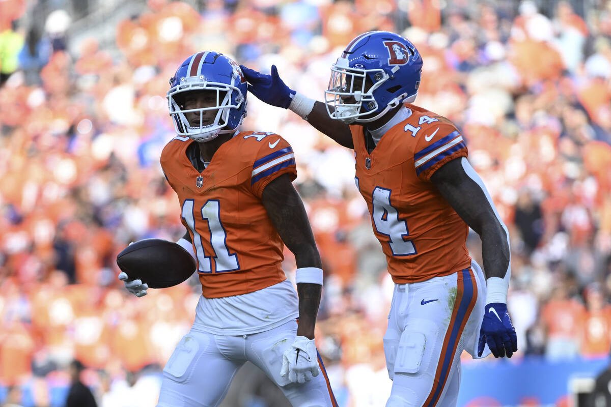 Denver Broncos wide receiver Josh Reynolds (11) celebrates his 9-yard reception for a touchdown ...