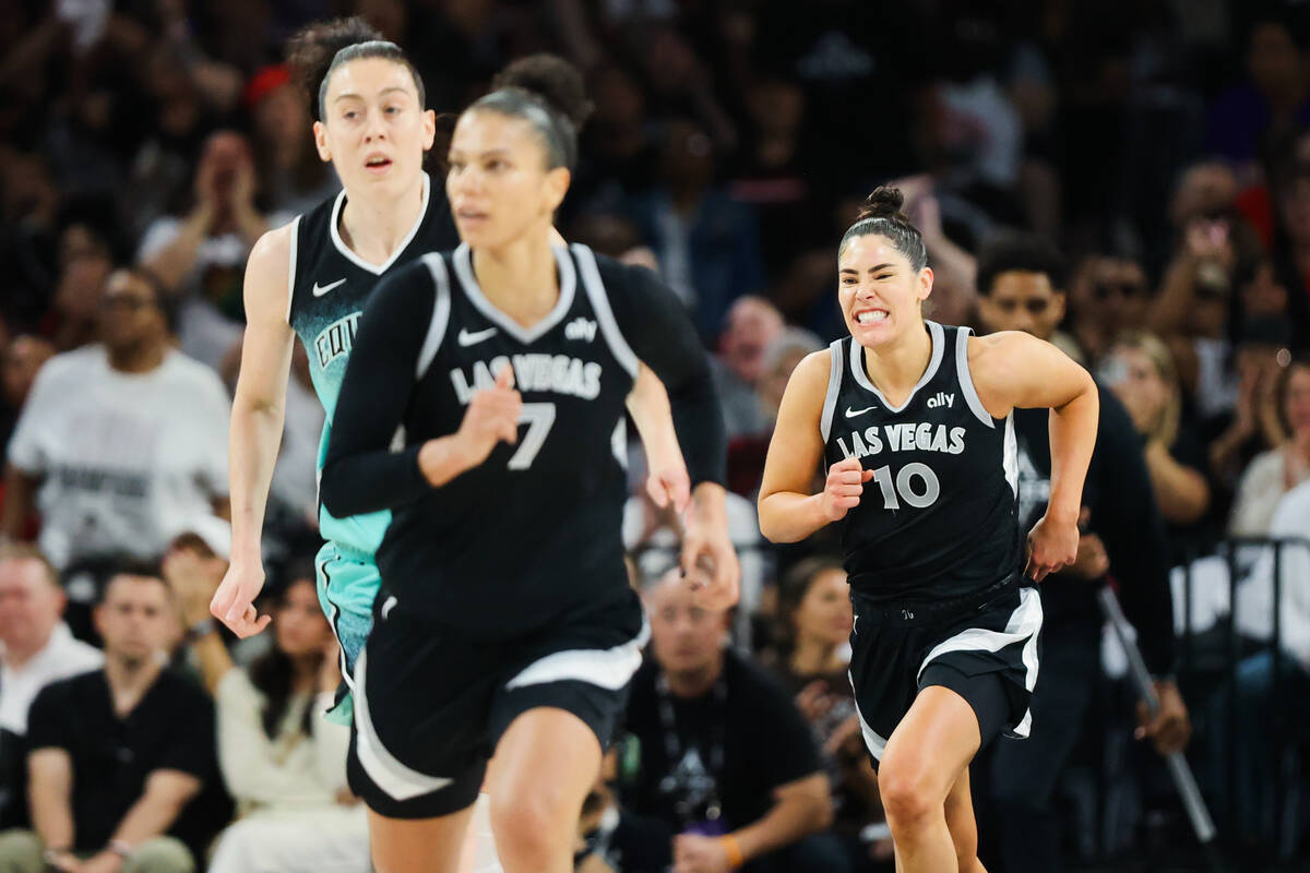 Aces guard Kelsey Plum (10) reacts after scoring during the first half of game four of a WNBA s ...