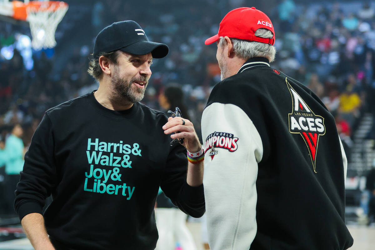 Actor Jason Sudekis, left, is seen during game four of a WNBA semifinals playoff series between ...