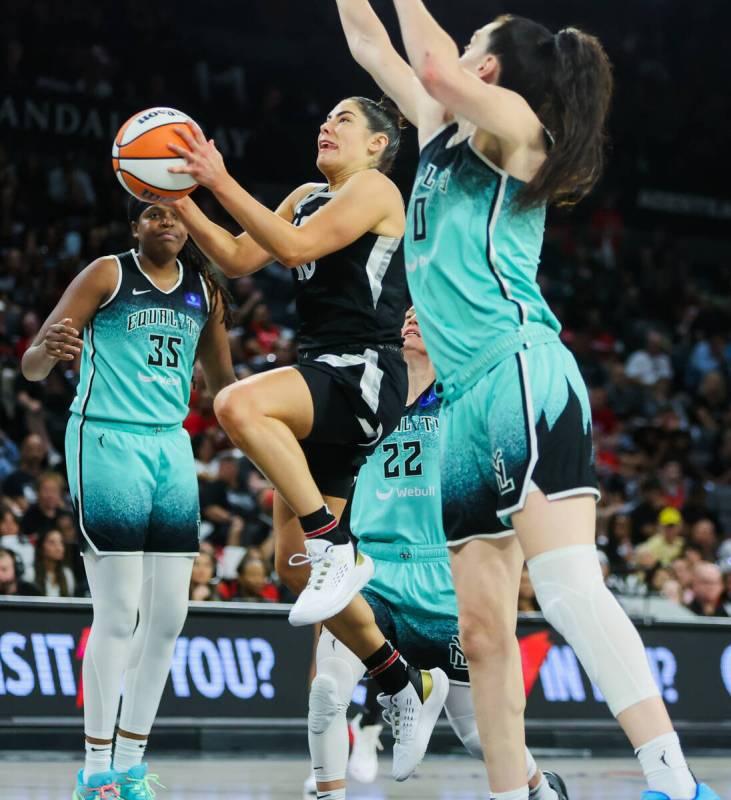 Aces guard Kelsey Plum (10) jumps up for a basket during game four of a WNBA semifinals playoff ...