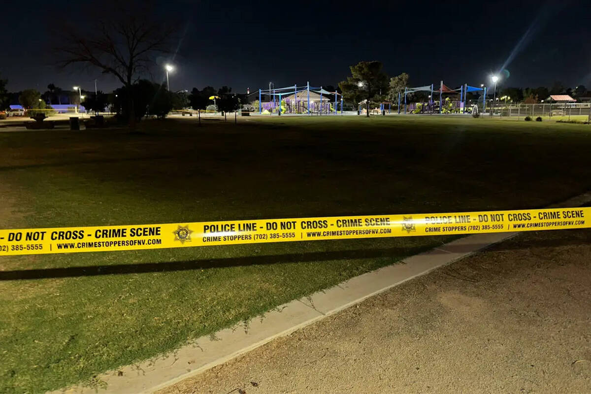 Crime scene tape is seen at Lewis Family Park in the east Las Vegas Valley, where the Metropoli ...